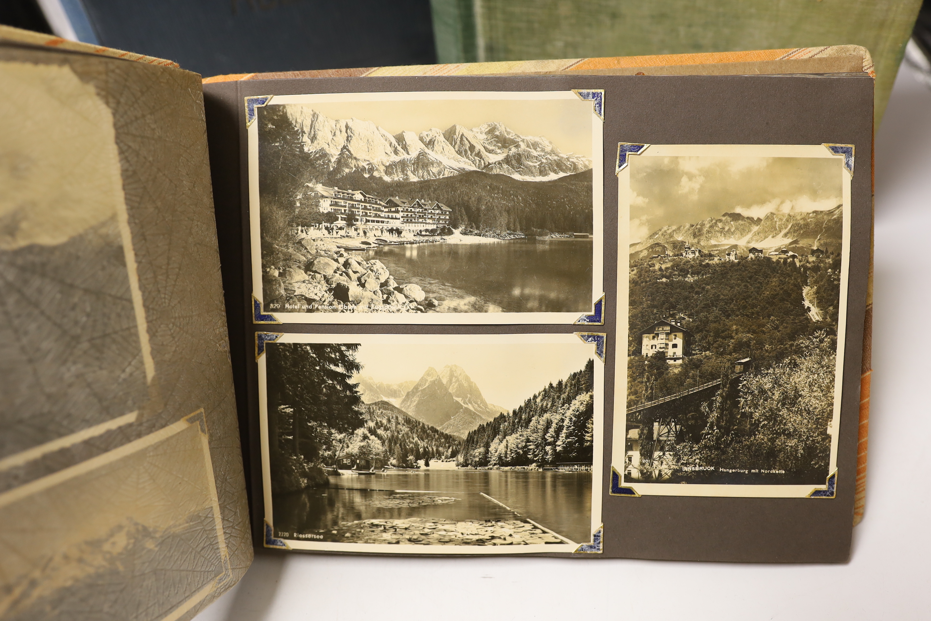 Three albums of Edwardian and later postcards and two early 20th century photograph albums, predominantly topographical (5)